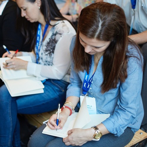 Woman writting in a book